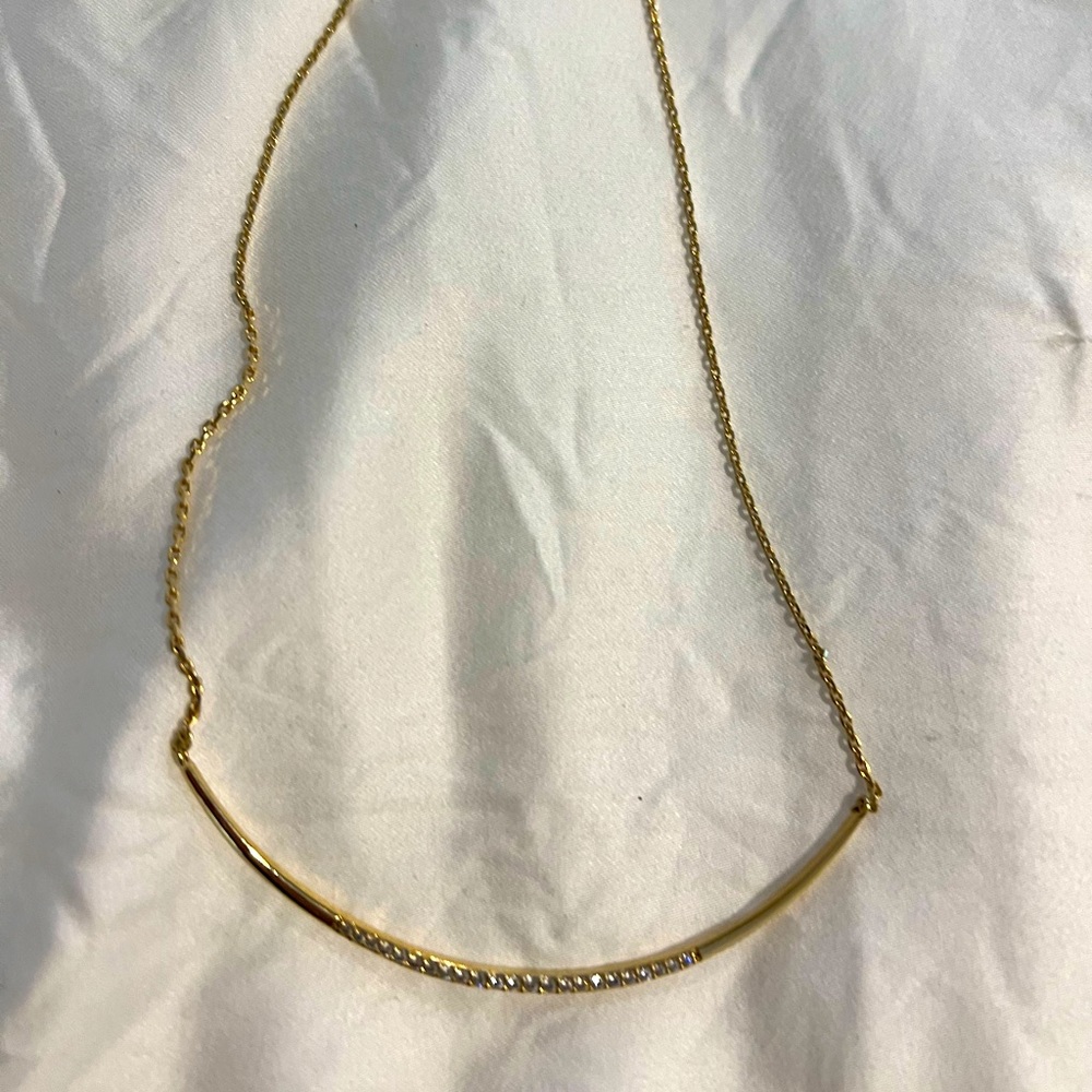 Stella & Dot Gold-tone crescent necklace with rhinestones. Condition: good